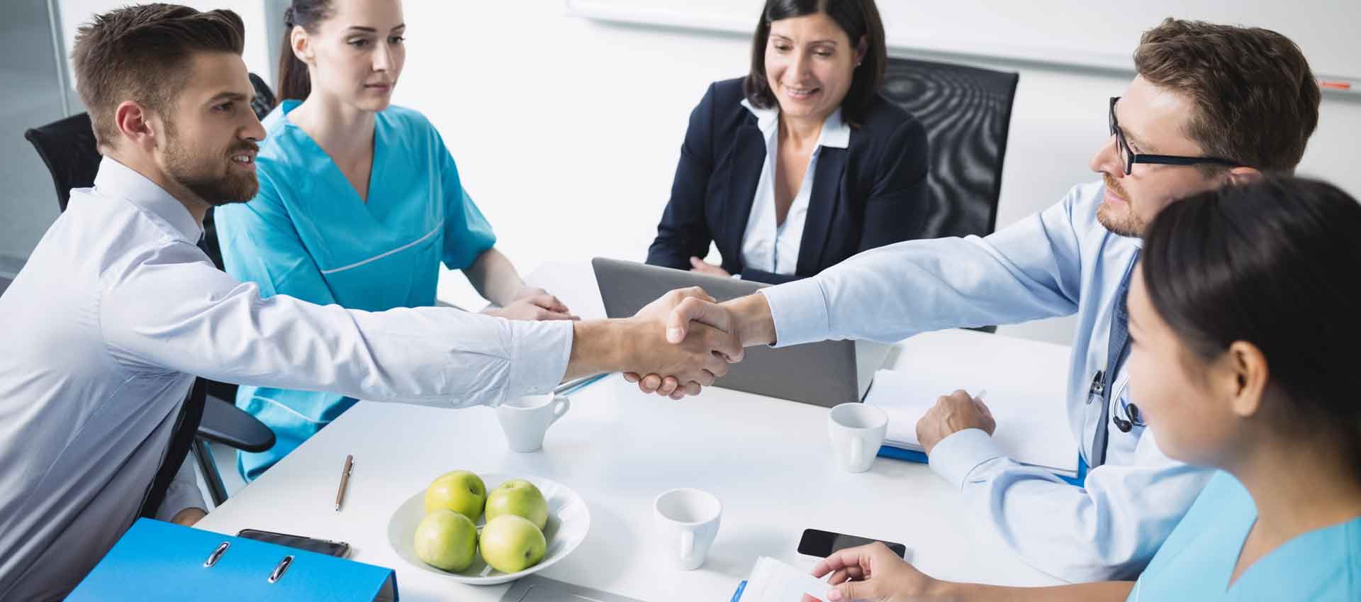 doctors shaking hands with each other